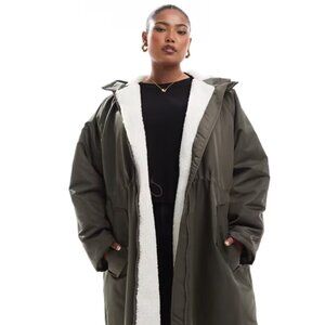 ASOS DESIGN Curve Teddy Lined Longline Rain Coat in Khaki